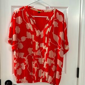 Cute orange and cream floral top. Sz L gathered waist lined v neck.  Never worn.